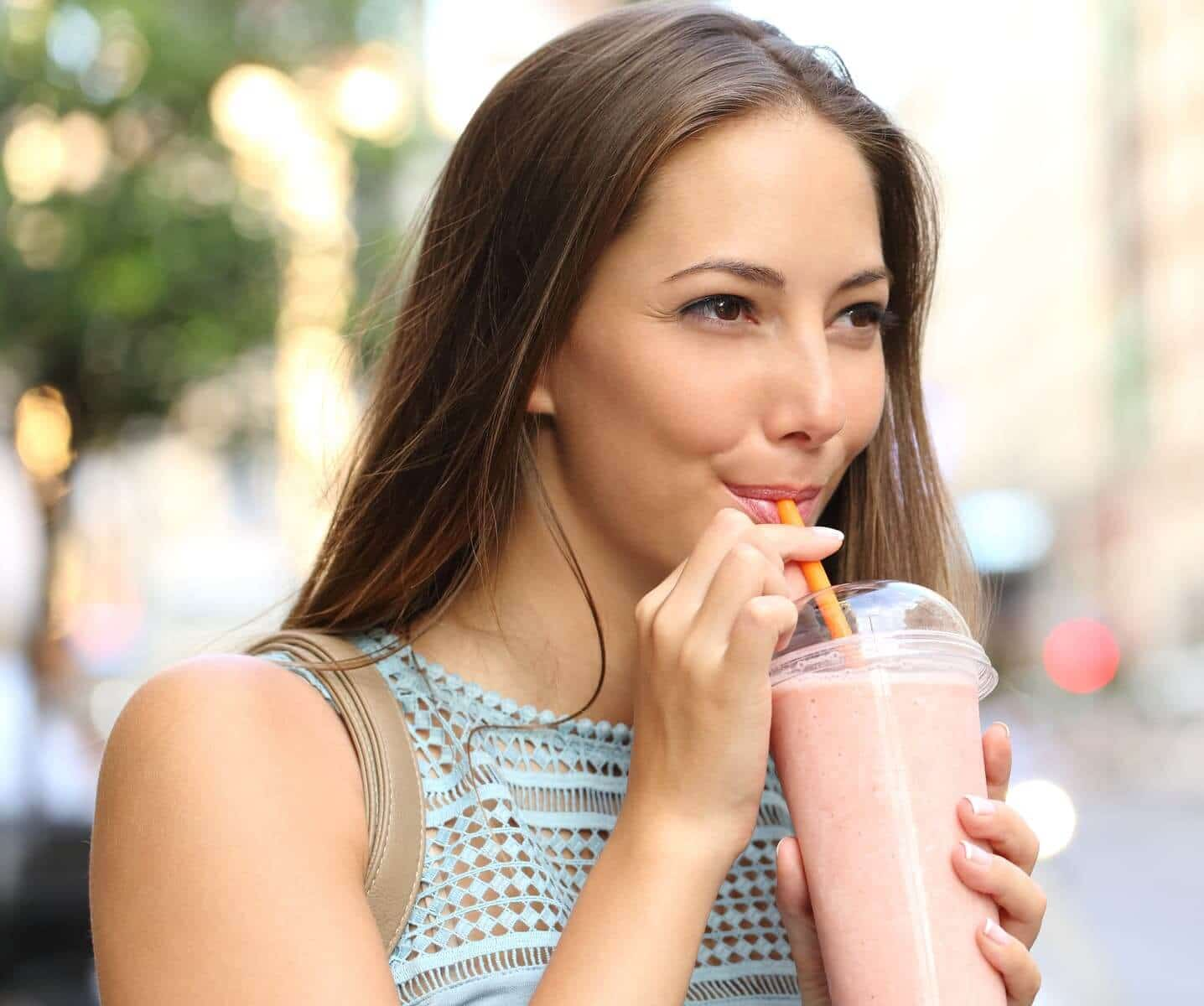 drinking strawberry smoothie